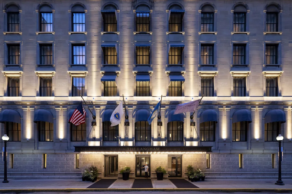 The Langham, Boston granite facade on Franklin Street at night via Expedia