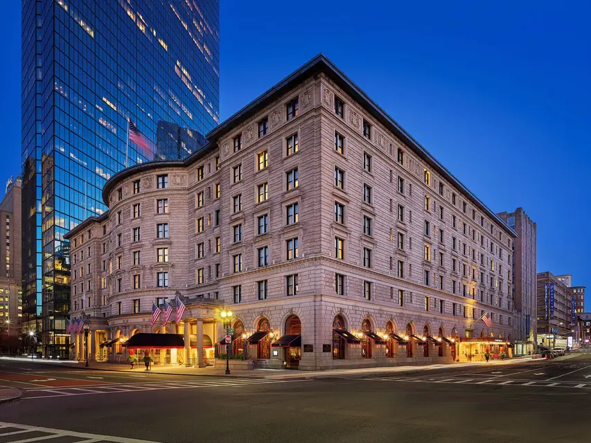 Fairmont Copley Plaza facade on Copley Square at dusk via Expedia