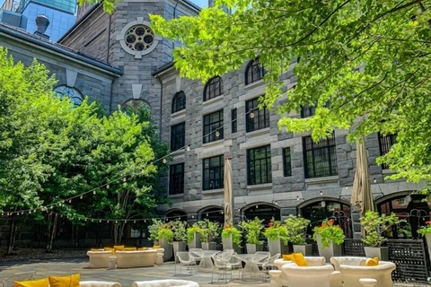 The Liberty Hotel granite facade and courtyard lounge in Boston via Expedia