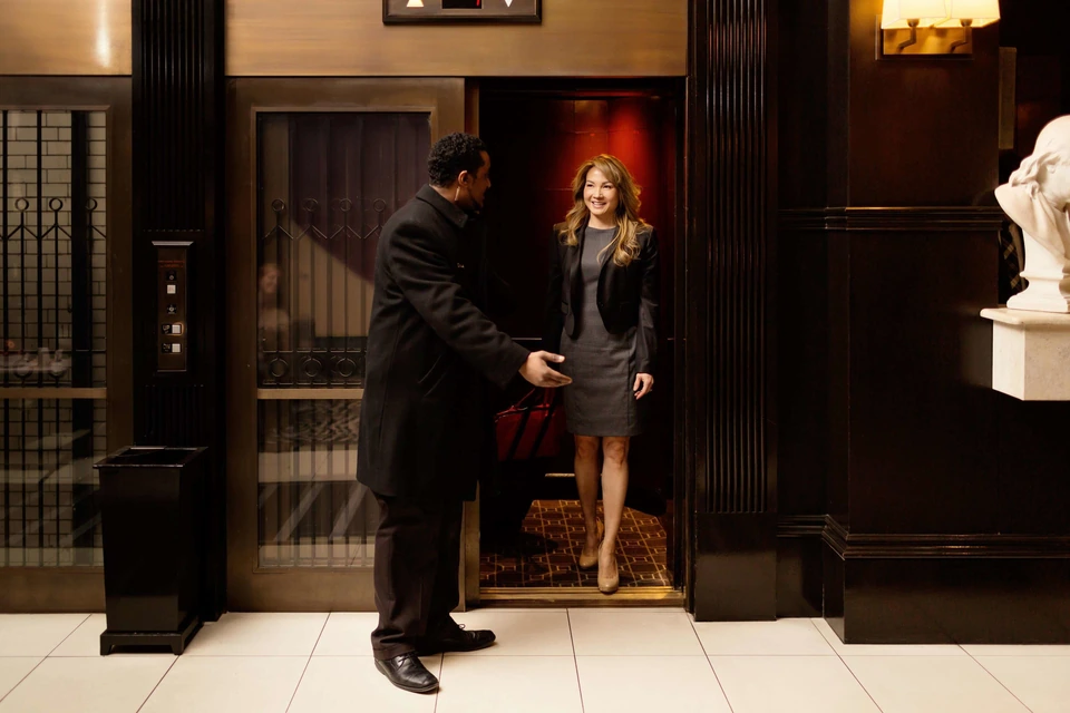 XV Beacon front entrance with doorman on Beacon Hill via Expedia