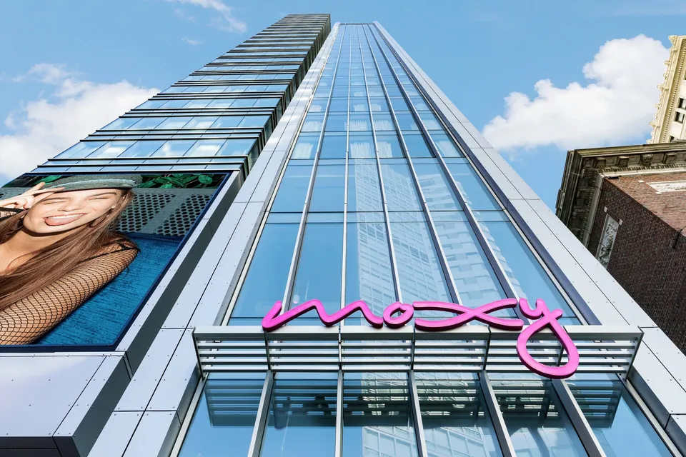 Moxy Boston Downtown tower with Moxy sign via Expedia