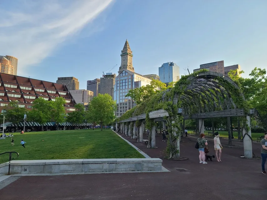 Trellis walkway and lawn at Christopher Columbus Park by the waterfront